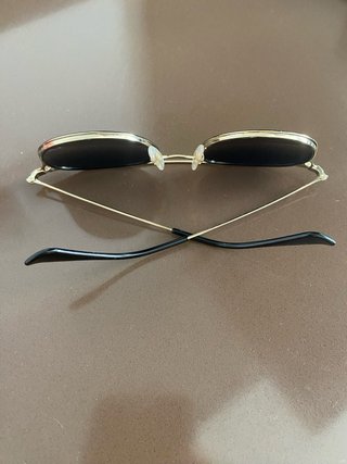 Gafas Ray-Ban doradas y azules