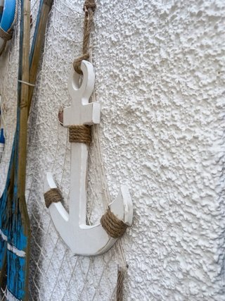 Decoración náutica ancla envejecida.