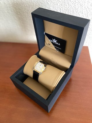 Reloj Optima Suizo