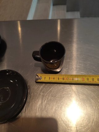 Juego de 8 tazas de café con platillos