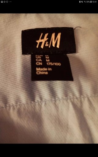 Camisa H&M azul claro con detalles