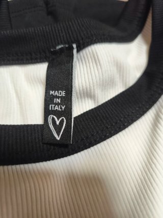 2 Camisetas sin mangas negras y blancas