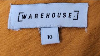 Vestido amarillo Warehouse