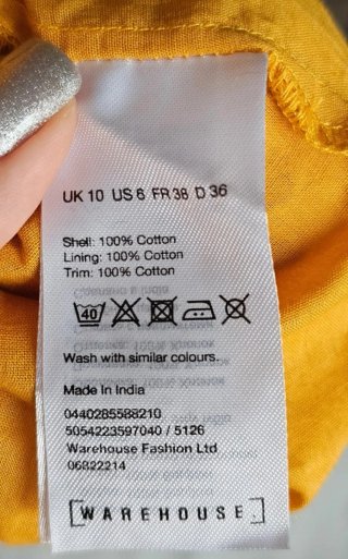Vestido amarillo Warehouse