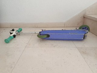 Patinete infantil plegable morado y rosa