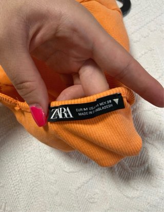 Top naranja tirantes cruzados