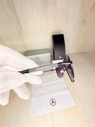 Occhiali da sole Mercedes Benz neri grigi