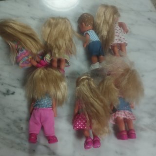 Lote 12 Muñecas Barbie y Evi Love