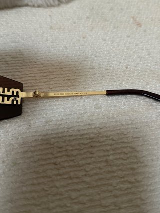 Occhiali da sole Miu Miu marroni e dorati