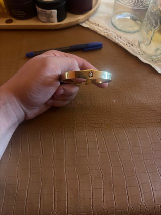 Pulsera Hermès H azul y Dorada
