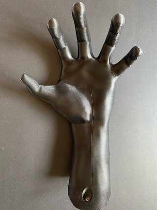 Supporto a forma di mano per palloni