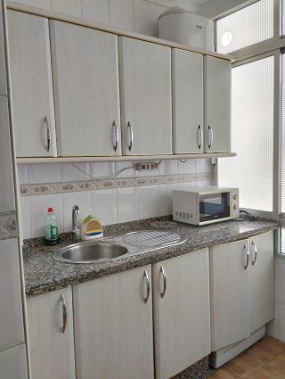 Alquiler de piso por habitaciones individuales.