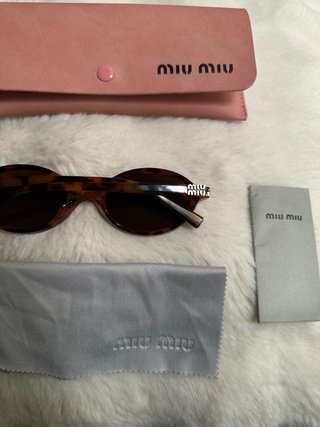 Occhiali da sole Miu Miu Tartaruga