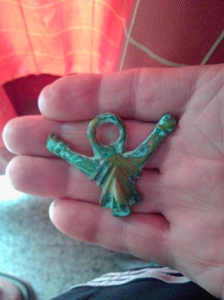 Falo grande de bronce