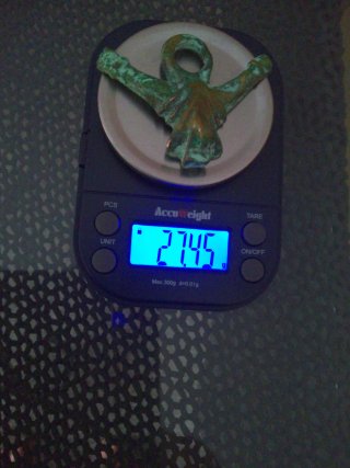 Falo grande de bronce