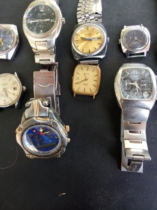 Vendo pack de reloj antiguo y correas  auténticas