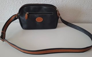 Bolso El Potro negro y marrón cuero.