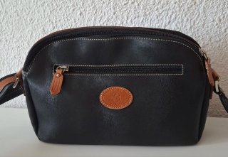 Bolso El Potro negro y marrón cuero.