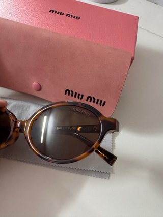 Occhiali da sole Miu Miu tartarugati ovali