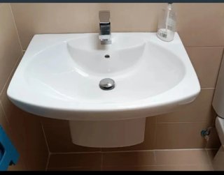 Lavabo de cerámica blanco