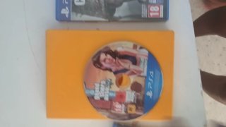 Console Sony PS4 nera + controller, cuffie e giochi