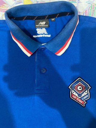 Polo New Balance Azul Talla M