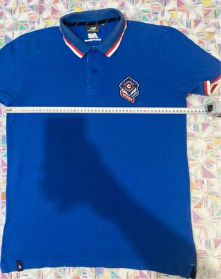 Polo New Balance Azul Talla M