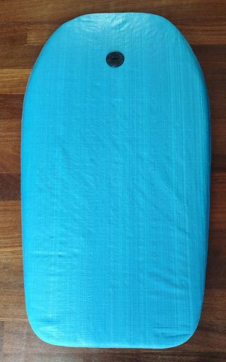 Tabla surf infantil azul con muñequera de agarre