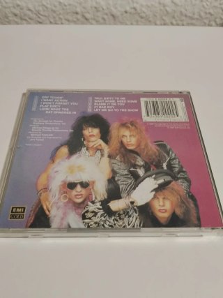 CD Poison Look What The Cat Dragged In