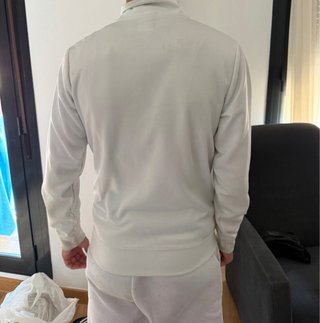 Chaqueta deportiva Nike blanca y rosa