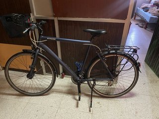 Bicicleta BTWIN azul con cesta y portabultos