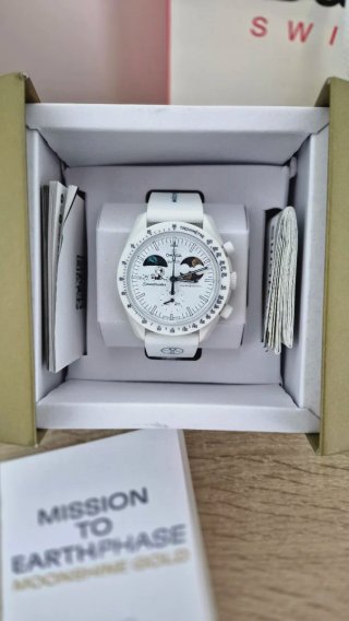 Omega Swatch Mission to Earthphase Moonshine Gold