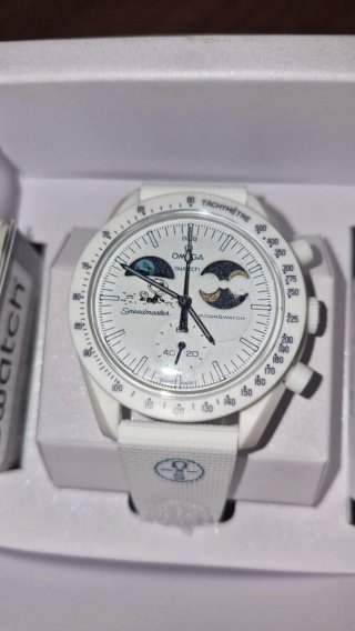 Omega Swatch Mission to Earthphase Moonshine Gold