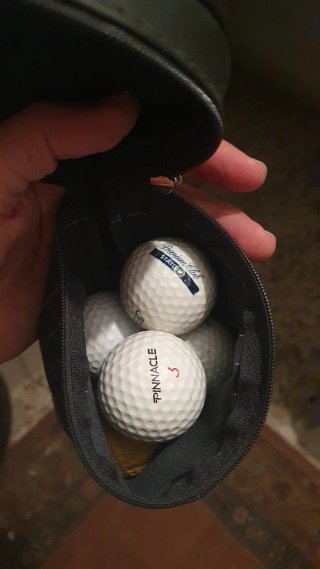 Palos de golf Spalding y Titleist