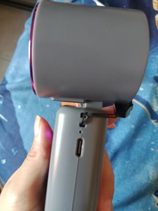 Ventilador de mano rosa y gris