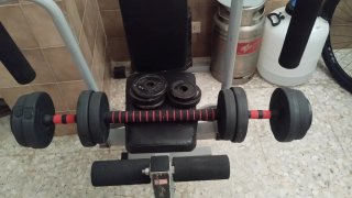 Barra de pesas con discos