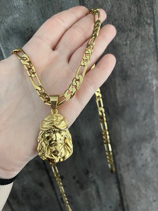 Cadena cartier y cristo bañado en oro