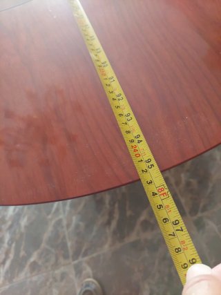 Mesa de comedor ovalada de madera