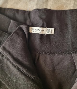 Pantaloni neri con cintura