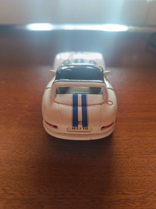 Miniatura coche deportivo blanco