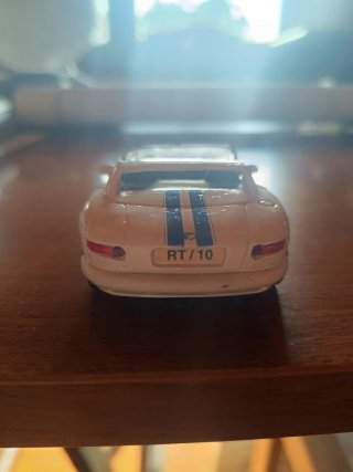Miniatura coche deportivo blanco