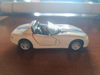 Miniatura coche deportivo blanco