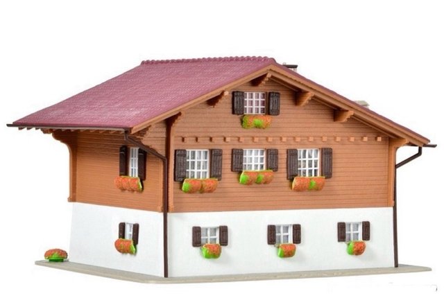 Chalet alpino Kibri H0 parcialmente desmontado.