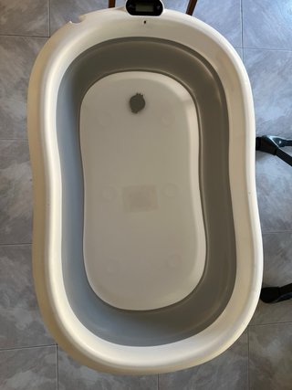 Bañera para bebé con cojín.