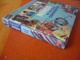 NIÑOS DE LOS CINCO CONTINENTES ( UWE OMMER ) FOTOS