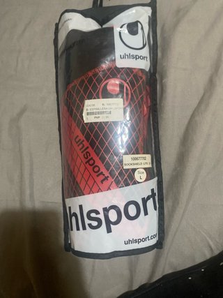 Espinilleras Uhlsport Negras y Rojas