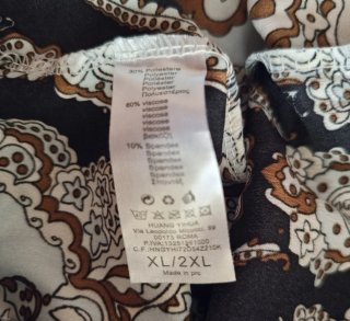 Pantaloni fantasia beige e nero