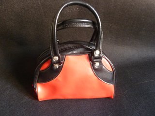 Bolso de mano Puma rojo y negro