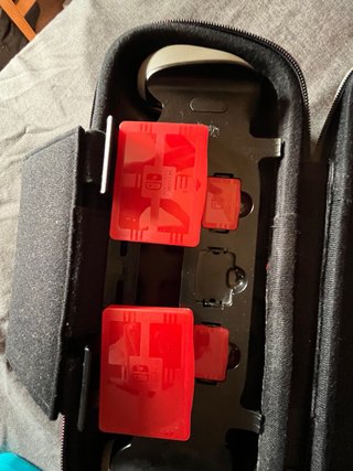 Nintendo Switch con 2 maletines y accesorios
