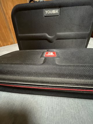 Nintendo Switch con 2 maletines y accesorios